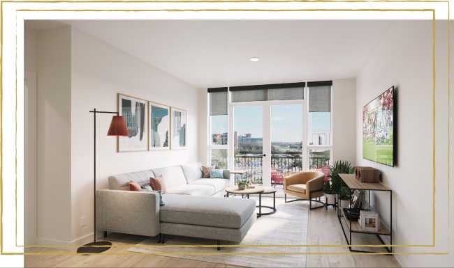 a living room with a large window, a tv and a couch